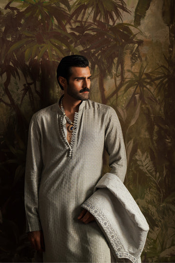 Man wearing a grey kurta pajama se